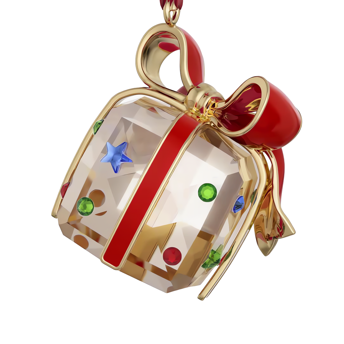 The Swarovski Holiday Cheers Gift Ornament by Swarovski features gold and red ribbon details, accented with blue, green, and red gemstones. Suspended against a white background, this exquisite ornament is the perfect festive addition to any tree.