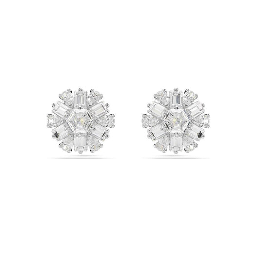 The Swarovski Idyllia Stud Earrings are a captivating pair of earrings featuring an exquisite floral design. A central diamond is elegantly surrounded by smaller baguette and round-cut crystals, all set in rhodium plating that glistens beautifully against the plain white background.