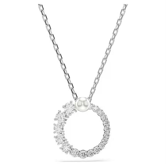 A Swarovski Matrix Crystal Pearl Necklace Pendant, crafted from rhodium-plated silver, features a shimmering chain with a circular pendant embellished with sparkling crystals and topped with a pearl accent.
