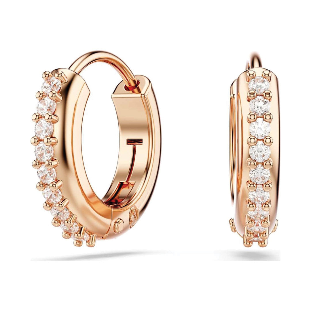 A pair of sophisticated Swarovski Matrix Hoop Earrings, designed by the renowned brand Swarovski, featuring a polished rhodium-plated finish with shimmering diamonds on the outer side. The earrings elegantly stand out against a white background and offer a secure latch closure.