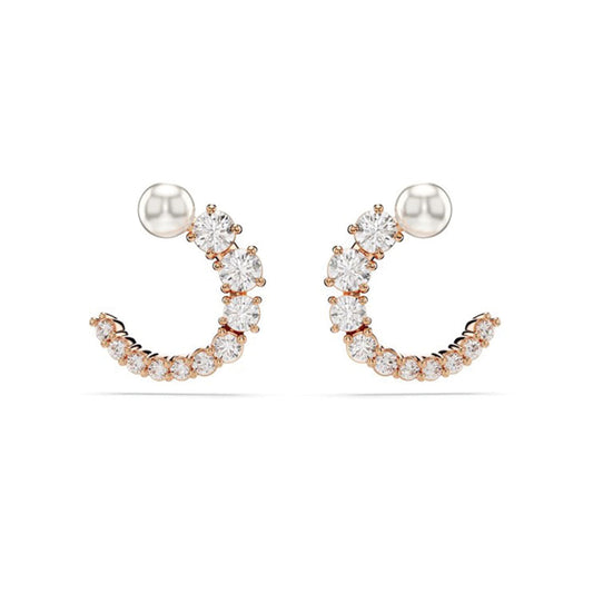 Introducing the Swarovski Matrix Crystal Pearl Circular Stud Earrings: A pair of elegant hoop earrings featuring a gold base, embellished with sparkling round diamonds that gradually increase in size from bottom to top. Each earring is finished with a crystal pearl stud, enhancing their refined sophistication. Crafted by Swarovski.