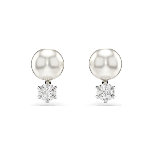 The Swarovski Matrix Crystal Pearl Stud Earrings, adorned with dazzling diamond-like accents that embody sophistication, are beautifully displayed against a simple white backdrop.