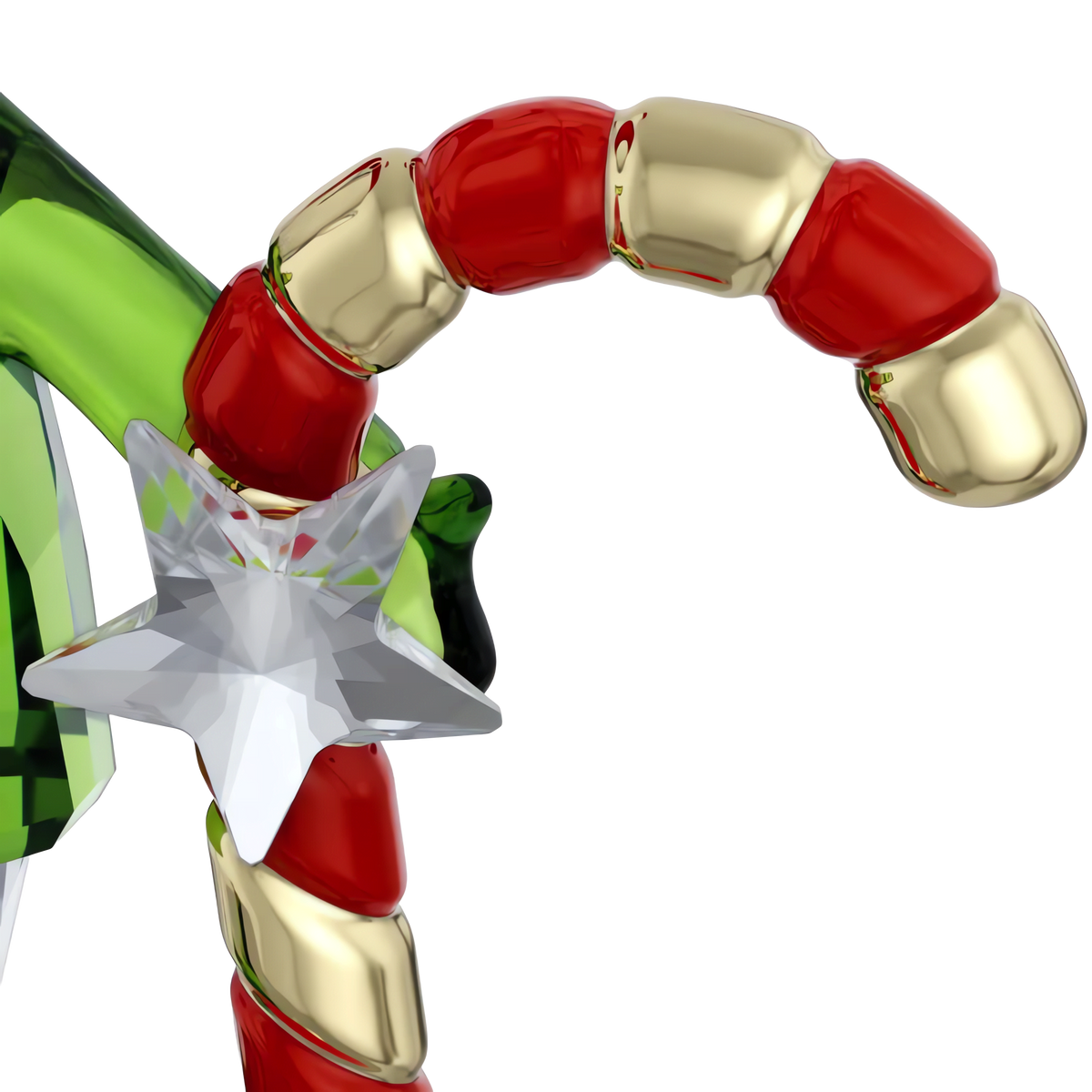 A close-up of the Swarovski Holiday Cheers Dulcis Elf and Candy Cane ornament from Swarovski, showcasing its shiny red, gold, and green segments and featuring a faceted clear star accent on the side. This festive decoration stands out against the plain white background.