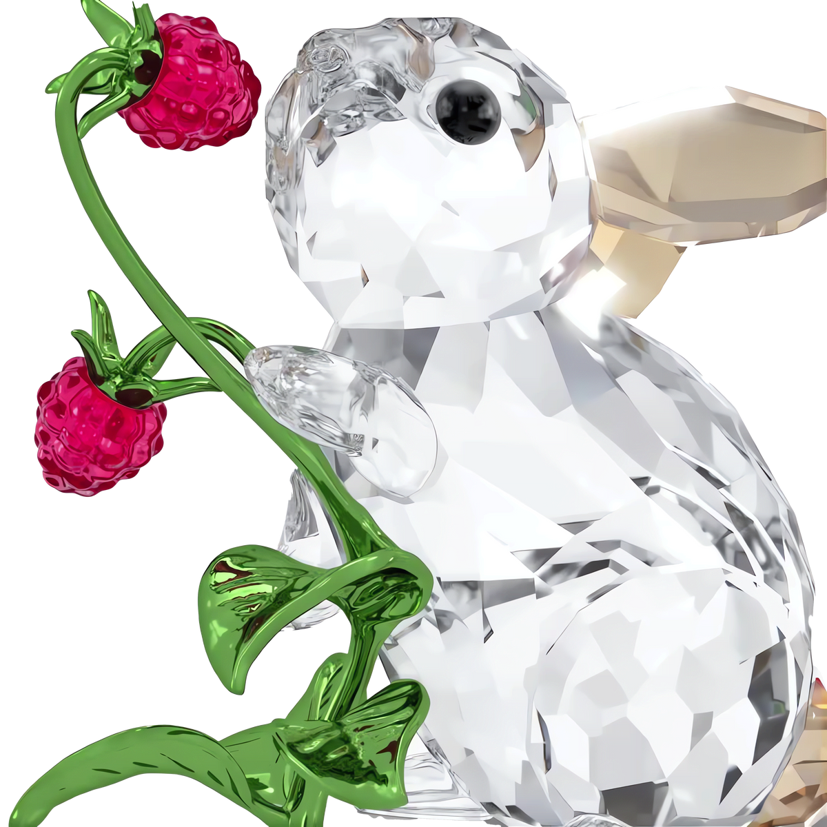 The Swarovski Idyllia Rabbit and Raspberries figurine by Swarovski features a faceted, transparent crystal rabbit with golden ears, a black eye, and a sparkling appearance. The bunny holds a green stem decorated with two red, textured raspberries, making this elegant rabbit decoration perfect for refined home décor.