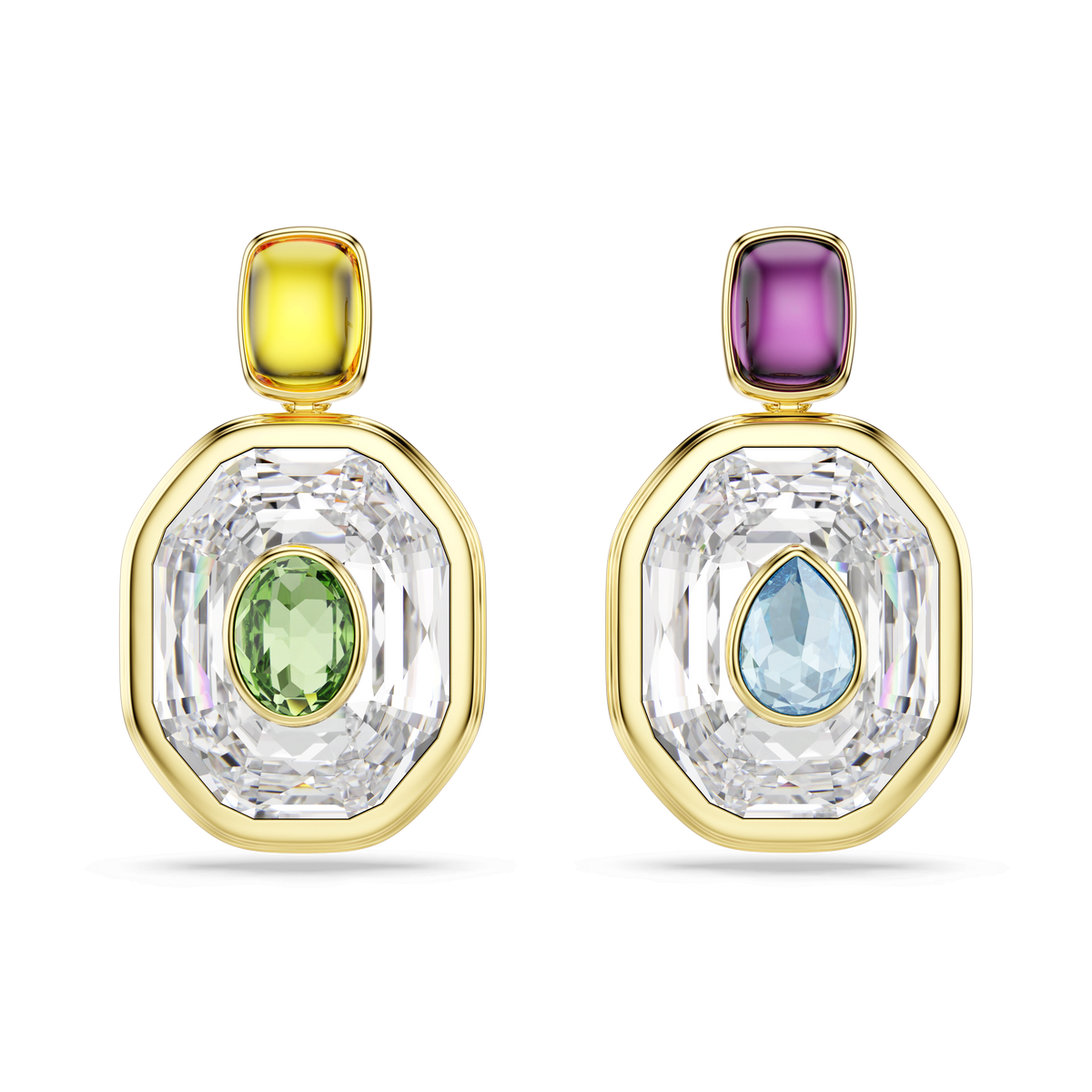 Swarovski Chroma drop earrings, featuring an asymmetrical design with large octagon-cut clear stones, each adorned with vibrant colored gems—a green accent and yellow top stone on the left earring, and a blue accent with purple top stone on the right. These multicoloured, gold-tone plated statement pieces by Swarovski are set against a white background and are available at Raffi Jewellers.