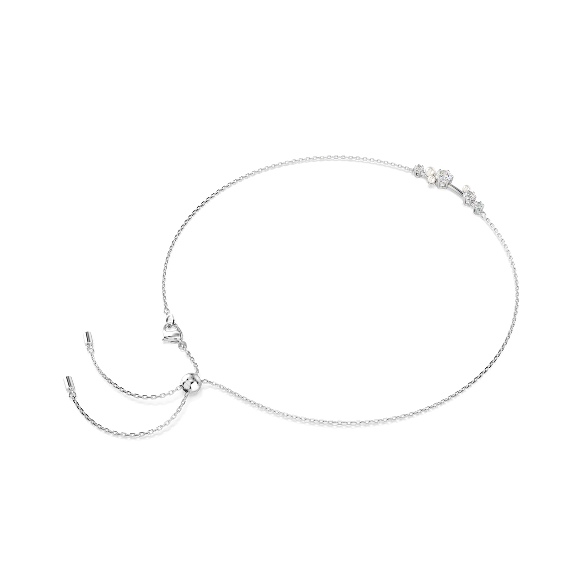 Showcasing timeless elegance against a plain white background, the Swarovski Constella necklace features luminous crystal pearls and round-cut stones on a refined rhodium-plated chain. Drawing inspiration from versatile jewelry design, this piece is adorned with sparkling accents that capture the iconic brilliance of Swarovski craftsmanship.