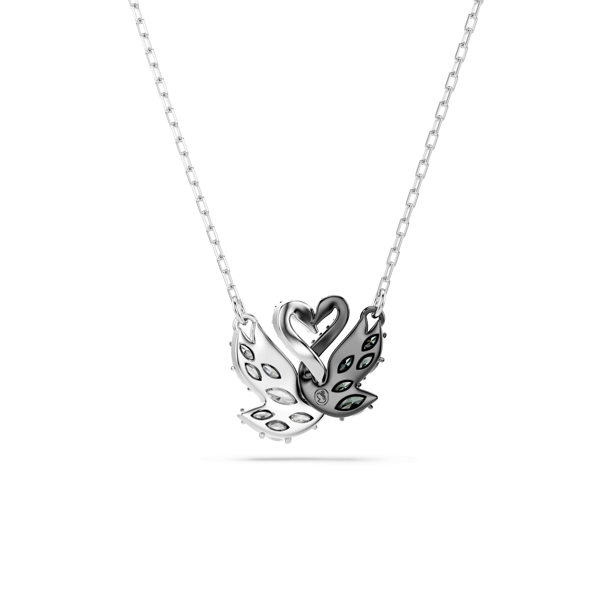 The Swarovski Swan pendant, designed by Swarovski, showcases a graceful swan with a heart-shaped neck and black accents on its wings. Sparkling Swarovski Zirconia embellish the mixed metal finish, while the pendant hangs elegantly from a delicate chain for lasting shine.