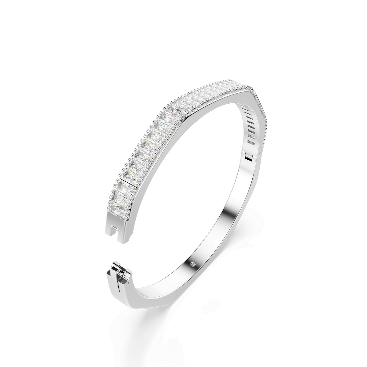Swarovski Matrix bangle featuring octagon-shaped, baguette-cut white stones set along the top, displayed on a white background. The bracelet showcases a sleek, modern design with a rhodium-plated finish and a partially open, hinged closure.