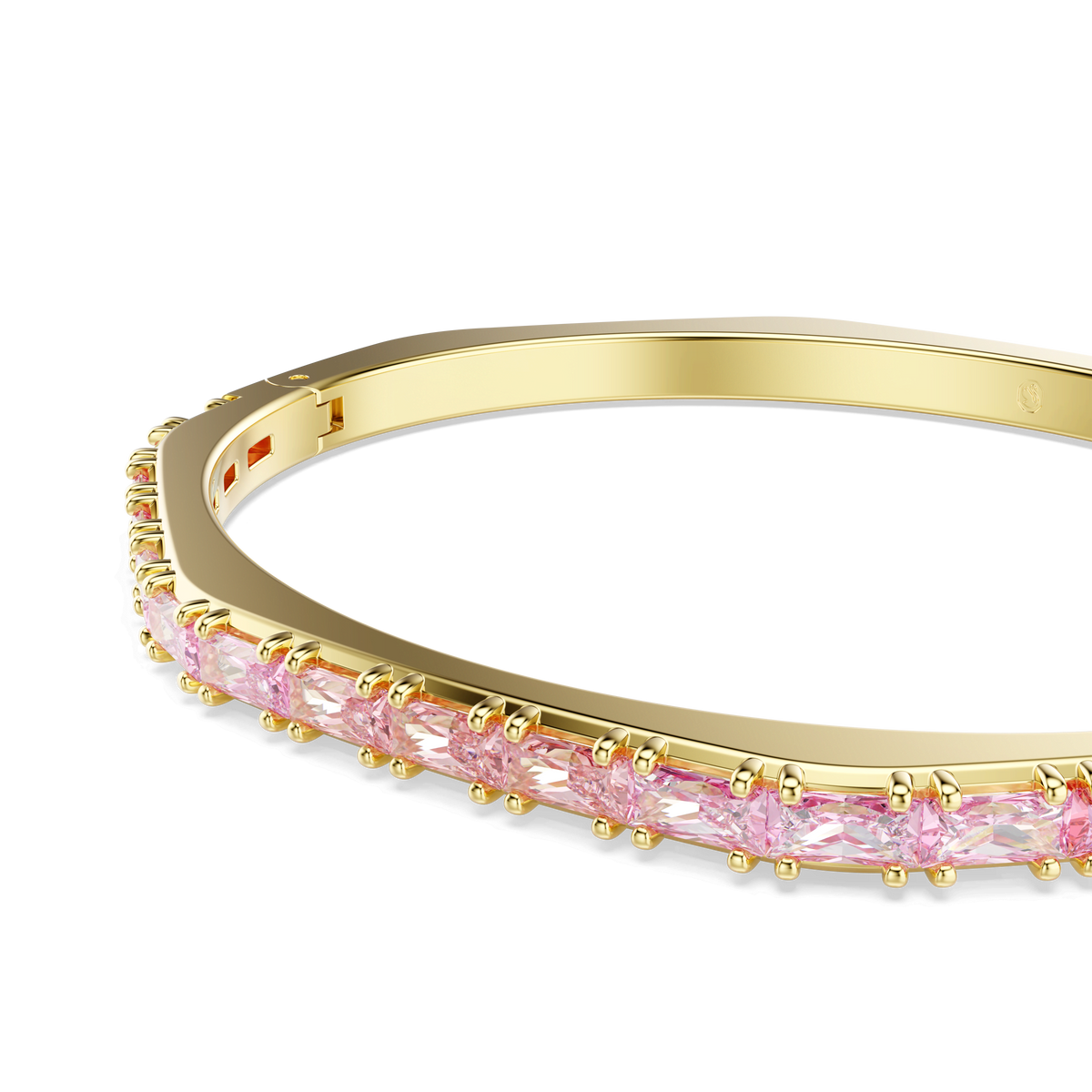 The Swarovski Matrix bangle, gold-tone plated and adorned with a row of baguette cut pink gemstones, is displayed on a white background.