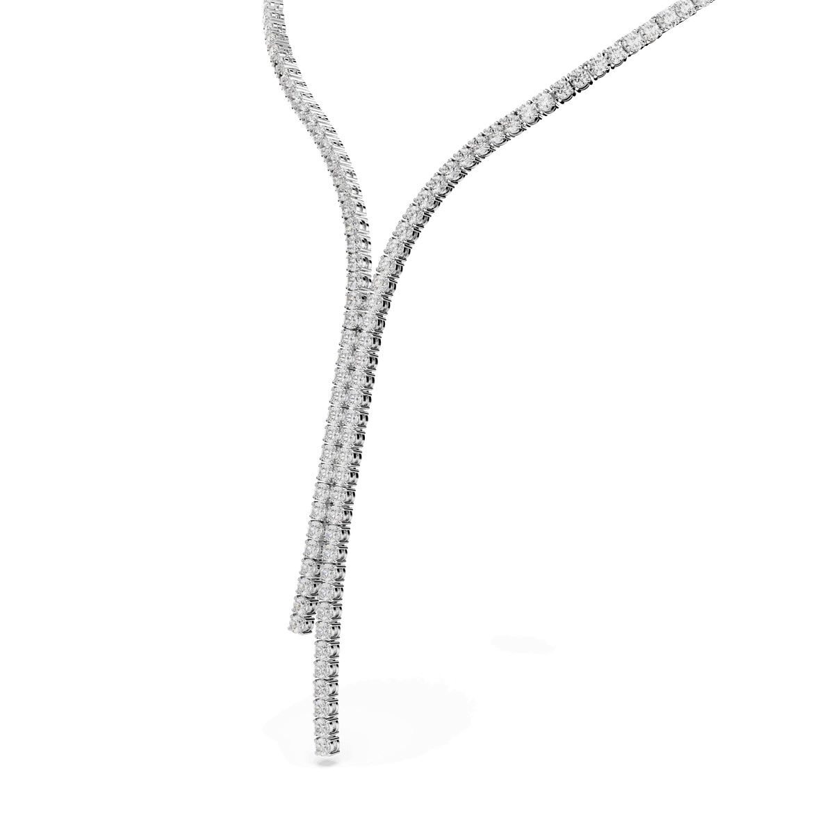 The Swarovski Matrix Y necklace, crafted in rhodium-plated metal with round-cut white stones, features two delicate strands that create a graceful Y design at varying lengths. The piece is elegantly showcased against a plain white background.