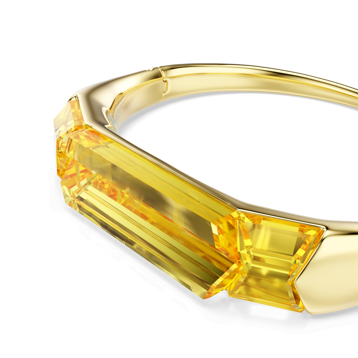 A gold-tone plated bangle featuring a bold, yellow centerpiece, the Swarovski Lucent bangle by Swarovski showcases refined elegance with its sleek and polished design, beautifully photographed on a white background—perfectly capturing the signature style of Swarovski Canada collections.
