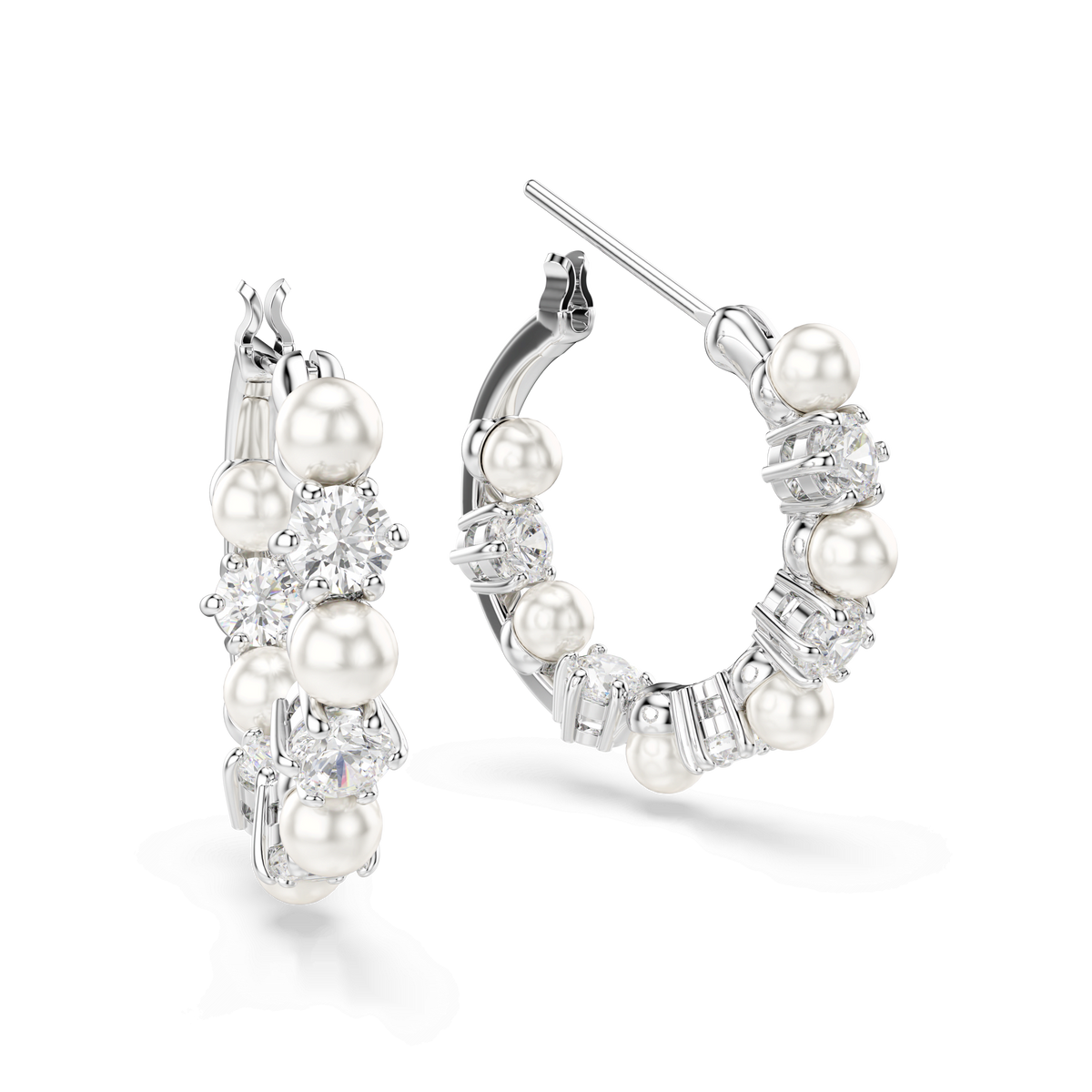 Swarovski Matrix hoop earrings featuring round-cut crystal pearls and sparkling Swarovski Zirconia gemstones in a white rhodium-plated finish, displayed on a plain white background.
