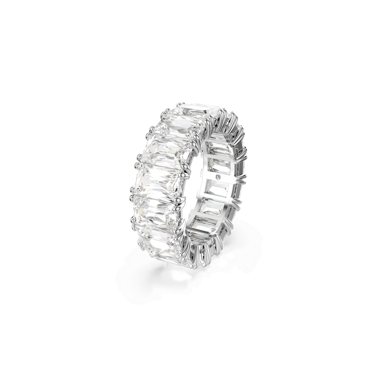 The Swarovski Matrix Vittore ring boasts a full circle of large, baguette-cut clear stones set closely together in gleaming rhodium plating, photographed on a white background—an elegant Swarovski jewelry piece ideal for refined style.