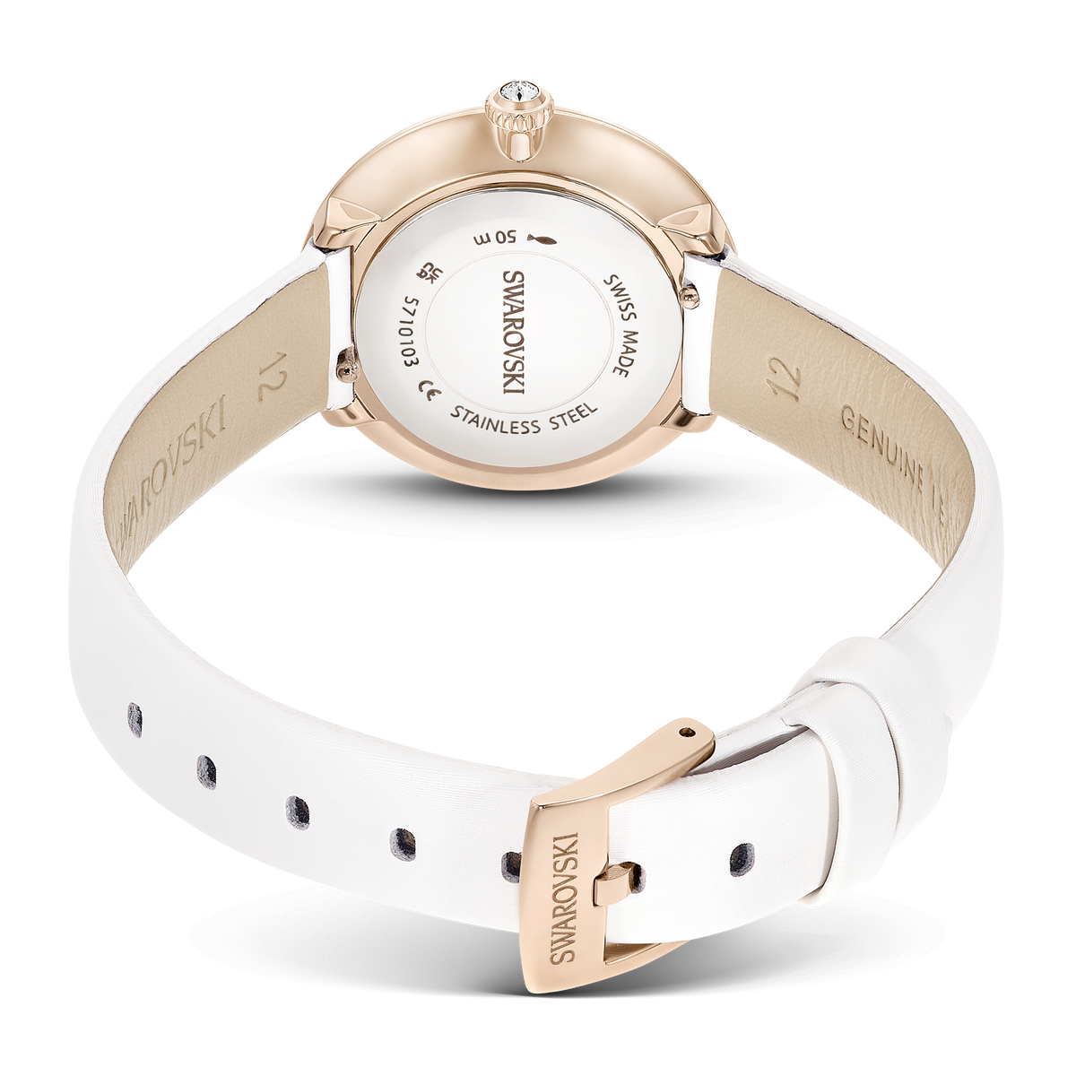 A Swarovski Matrix Tennis watch in white leather with a champagne gold-tone finish is displayed from the back, featuring a stainless steel case, engraved brand details, and signature Swiss Made craftsmanship—available at Raffi Jewellers.