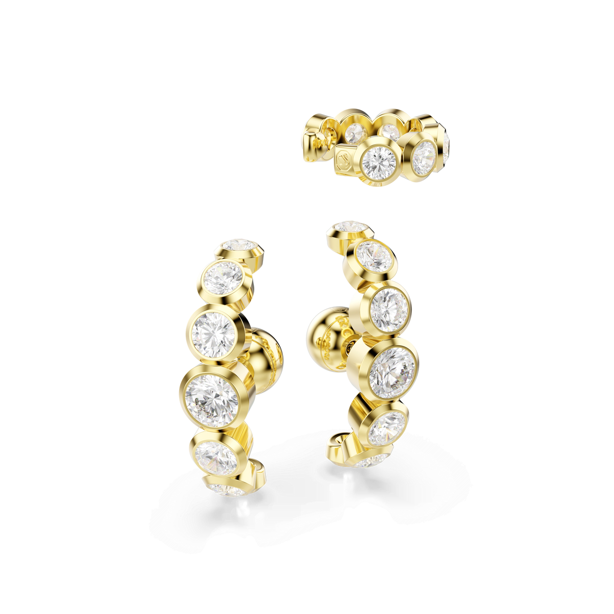 The Swarovski Imber ear cuff set comprises three gold-tone plated pieces—two hoop earrings and one ear cuff—each embellished with round, white crystals, beautifully displayed against a white background.
