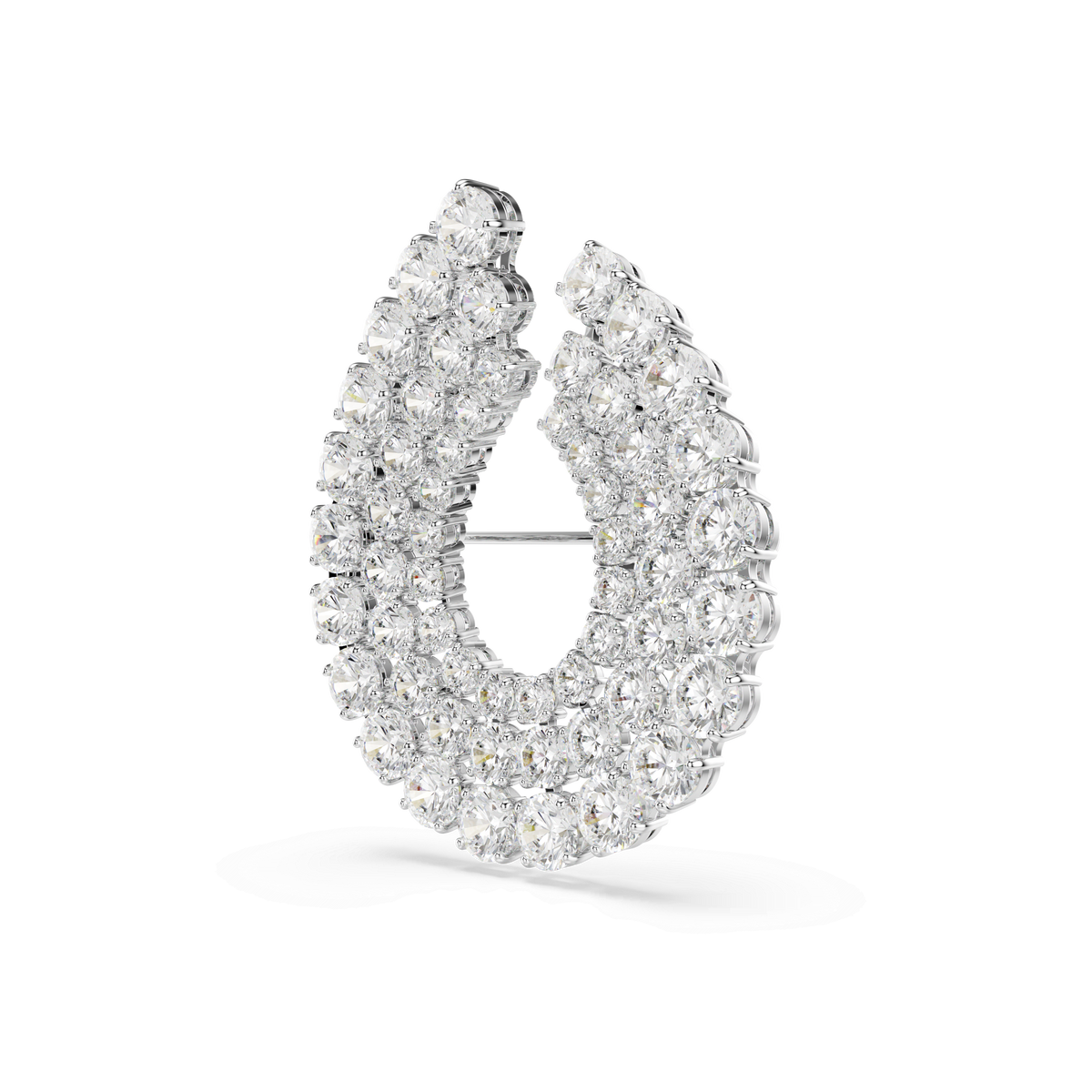 The Swarovski Matrix brooch features an open oval, crescent-shaped design adorned with two rows of round, sparkling Swarovski Zirconia set in rhodium-plated silver, showcased on a white background.