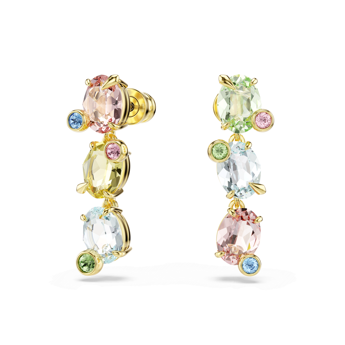 A pair of Swarovski Gema drop earrings featuring an asymmetrical design in gold-tone plating, showcasing a mix of oval and round cuts with multicolored crystals in soft pastel shades of pink, yellow, blue, green, and white, displayed against a plain white background.