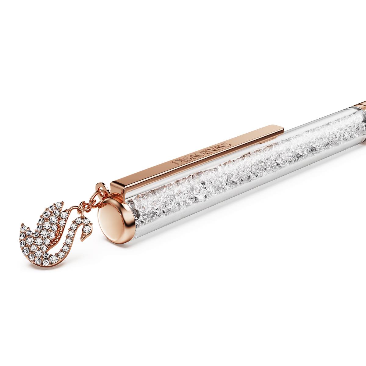 Introducing the Swarovski Crystalline ballpoint pen, Swan, by Swarovski—a luxurious writing instrument with a rose gold-tone plated clip and tip, a barrel shimmering with sparkling crystals, and an elegant swan-shaped crystal-encrusted charm adorning the top.