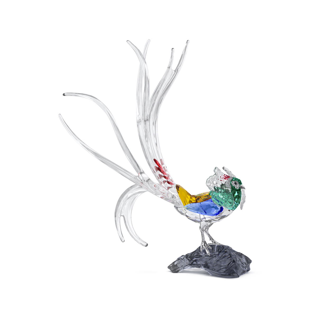The Swarovski Idyllia SCS Annual Edition 2026 Lady Amherst’s Pheasant is a colorful crystal figurine that captures the elegance of the distinctive bird, with green, blue, yellow, and red accents on its clear body and a long, graceful tail. It stands atop a textured gray base and beautifully showcases Swarovski’s renowned craftsmanship.