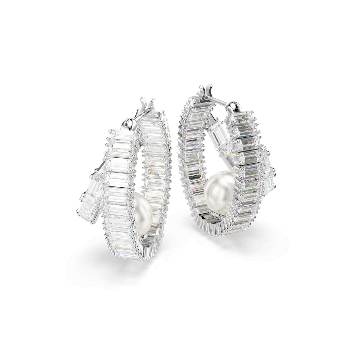 A pair of Swarovski Ariana Grande x Swarovski hoop earrings, crafted in white with baguette-cut gemstones and a prominent crystal pearl at the center of each rhodium-plated earring, displayed on a white background.