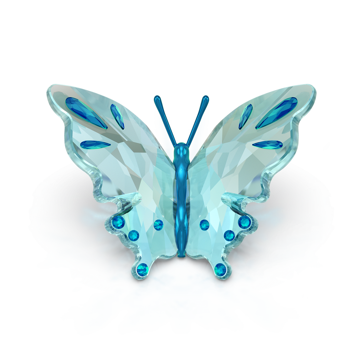 The Swarovski Idyllia Butterfly, Turquoise by Swarovski features faceted turquoise wings and delicate blue gem accents, displayed against a plain white background—the perfect dazzling addition to any butterfly collector’s display.