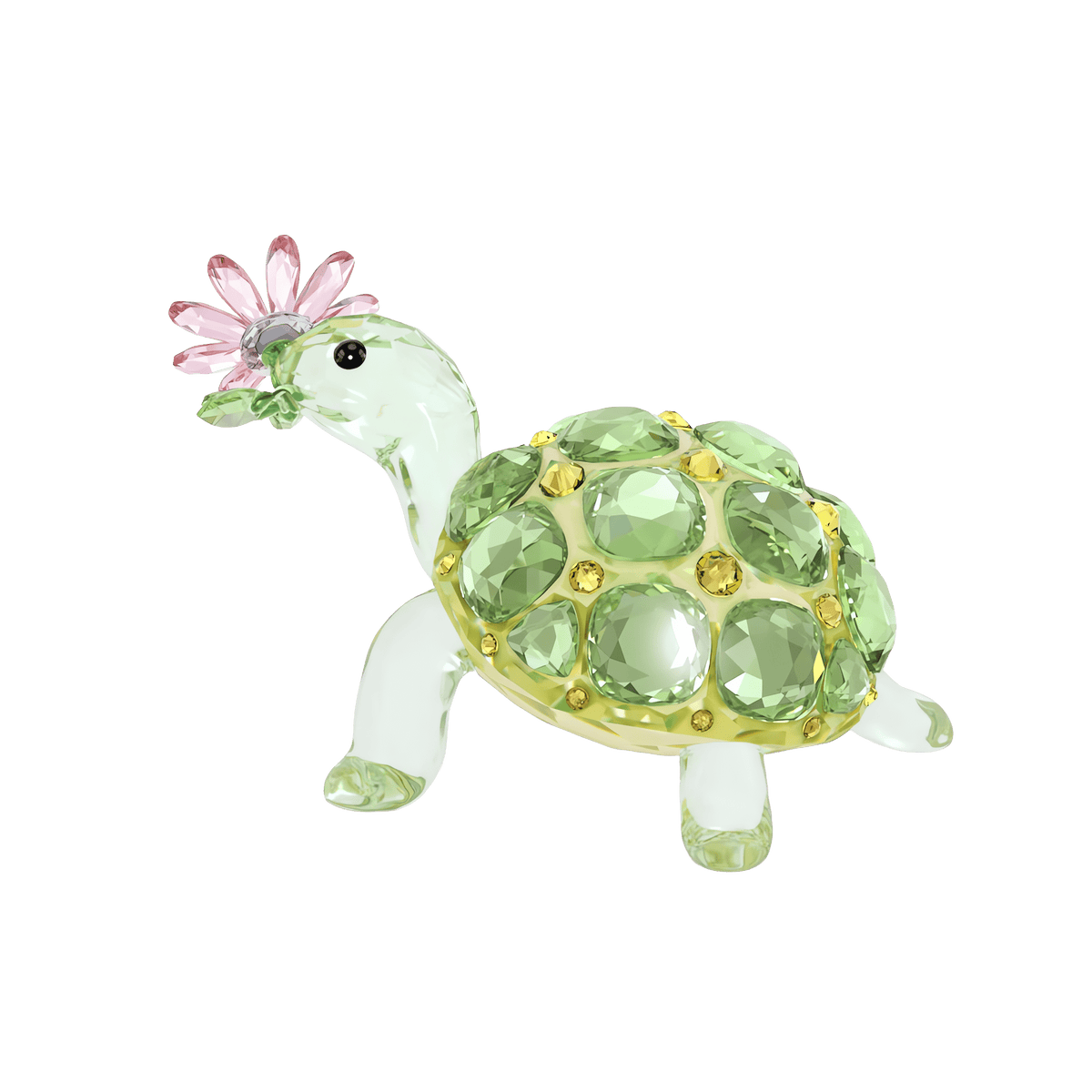 The Swarovski Idyllia Tortoise and Daisy by Swarovski features a decorative glass turtle with a green gemstone shell, yellow accents, clear legs, and a head crowned with delicate pink crystal petals resembling a flower. This exquisite crystal tortoise ornament is displayed against a plain white background.