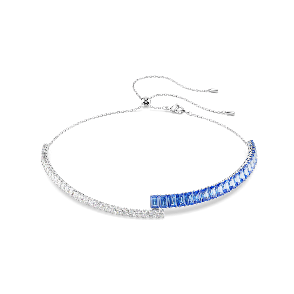 Introducing the Swarovski Matrix Choker BLU/RHS: a refined silver choker necklace by Swarovski, featuring one side accented with clear square-cut stones and the other with striking blue square-cut stones, elegantly meeting at an open front. The adjustable chain and clasp ensure a comfortable fit. Discover this sophisticated piece at Raffi Jewellers, an official partner of Swarovski Canada.