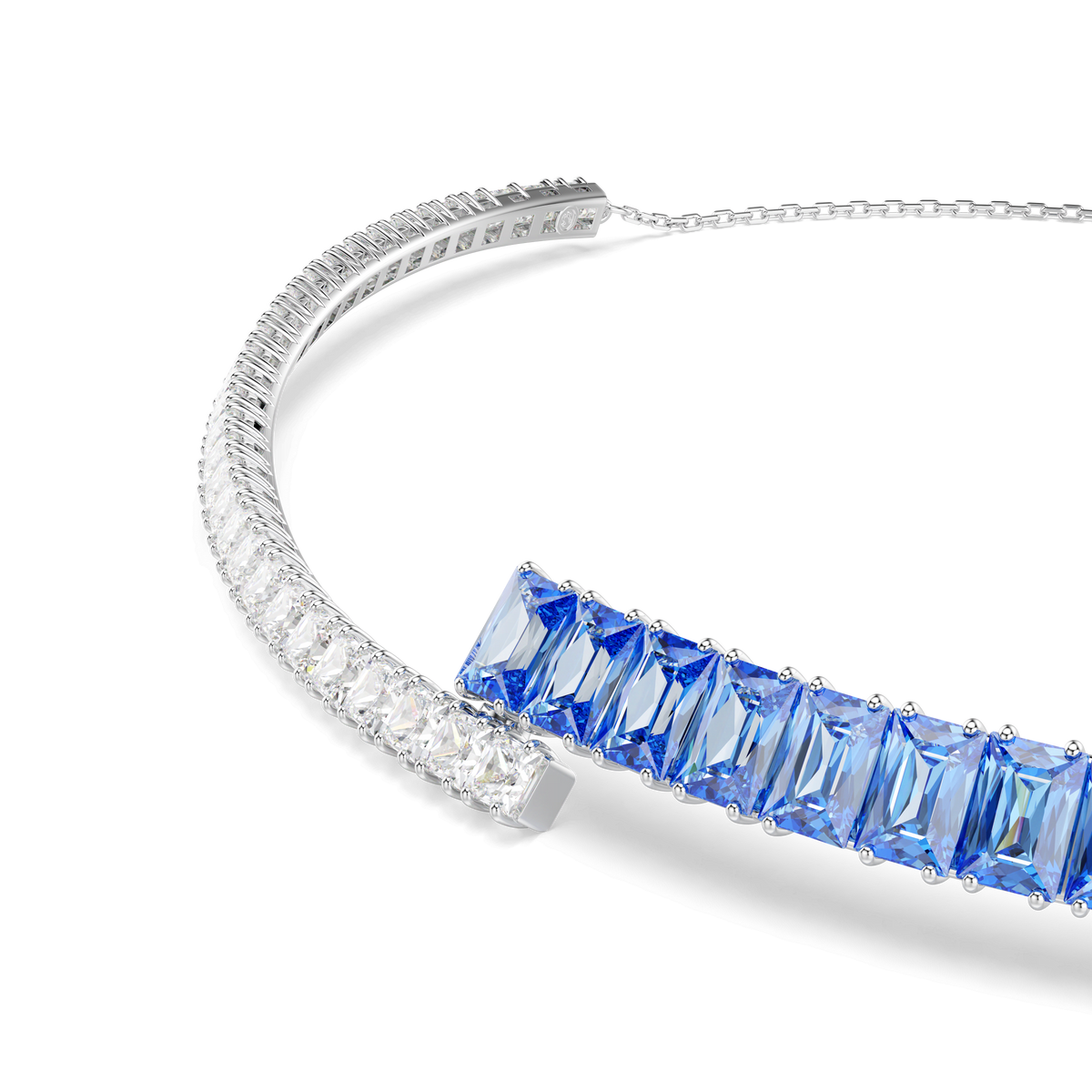 The Swarovski Matrix Choker BLU/RHS from Swarovski showcases a refined gradient design with square-cut blue and clear gemstones set in radiant silver hues, placing the striking blue stones front and centre. This elegant piece captures the sophisticated style that has become synonymous with Swarovski.