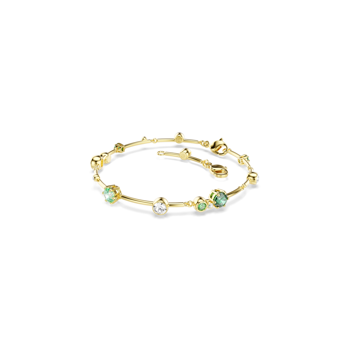 Swarovski Constella bracelet with mixed-cut green and white gemstones, including sparkling Swarovski Zirconia, set along a slender 18K gold-finished band. Shown on a white background.
