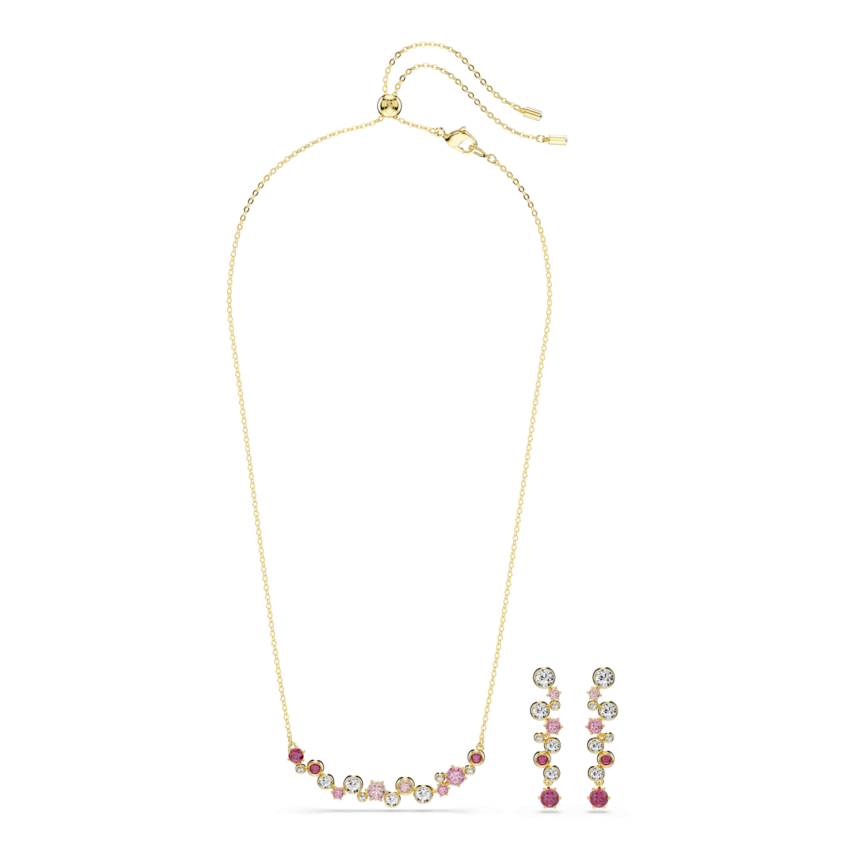 Discover the Swarovski Constella set—Mixed cuts, Multicoloured, Gold-tone plated—including a gold-tone necklace adorned with multicolored gemstones in a graceful curve and matching drop earrings featuring the same vibrant stones. Both pieces from Swarovski, available at Raffi Jewellers, are showcased against a white background and exemplify the exquisite craftsmanship of Swarovski Canada.