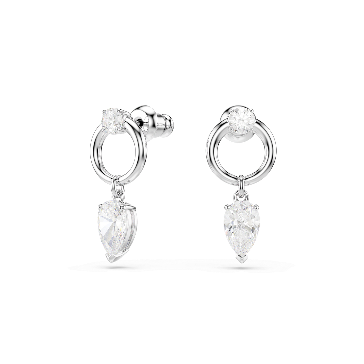 A pair of Swarovski Mesmera drop earrings by Swarovski, featuring mixed cuts with a small round white gemstone on top, circular loops, and a dangling teardrop-shaped white gemstone, all rhodium plated and set against a plain white background.