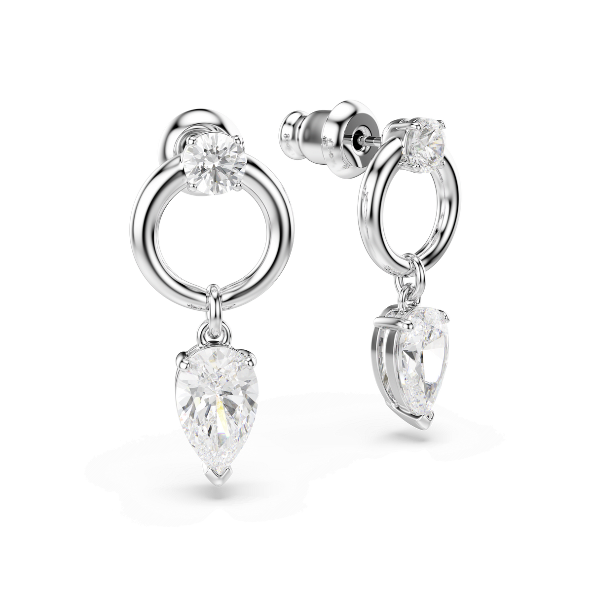 A pair of Swarovski Mesmera drop earrings in white, featuring mixed-cut clear gemstones in both round and pear shapes, crafted with a circular design and finished in rhodium plating. These elegant earrings feature screw-back closures and are set against a white background. Available from an authorized Swarovski retailer in Canada.
