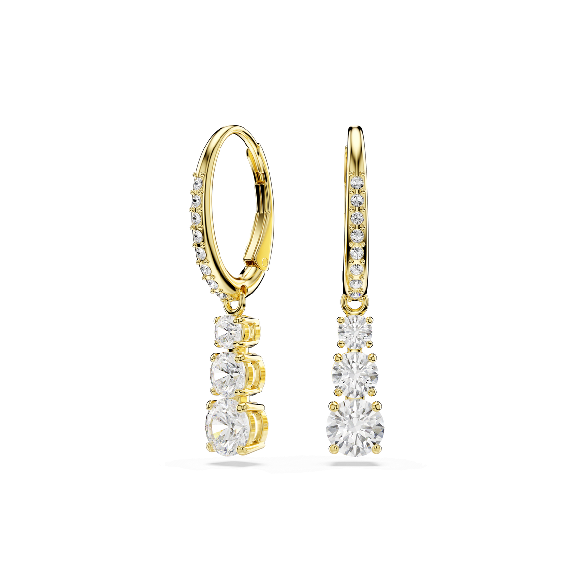 The Swarovski Stilla Attract hoop earrings, featuring an 18K gold finish, showcase round-cut white stones with three dangling clear gemstones and smaller pavé stones along the front of the hoop, displayed on a white background.