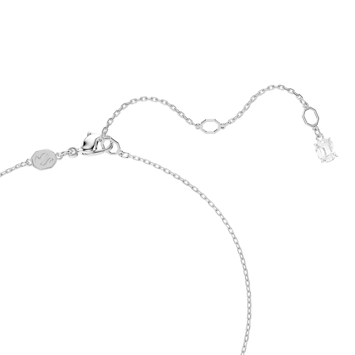A delicate silver chain necklace featuring an adjustable clasp, a small round tag, and a stunning rectangular Swarovski Zirconia gemstone pendant, presented here as the Swarovski Swan Pendant. This elegant necklace from Swarovski showcases mixed cuts in blue tones and is displayed on a white background.