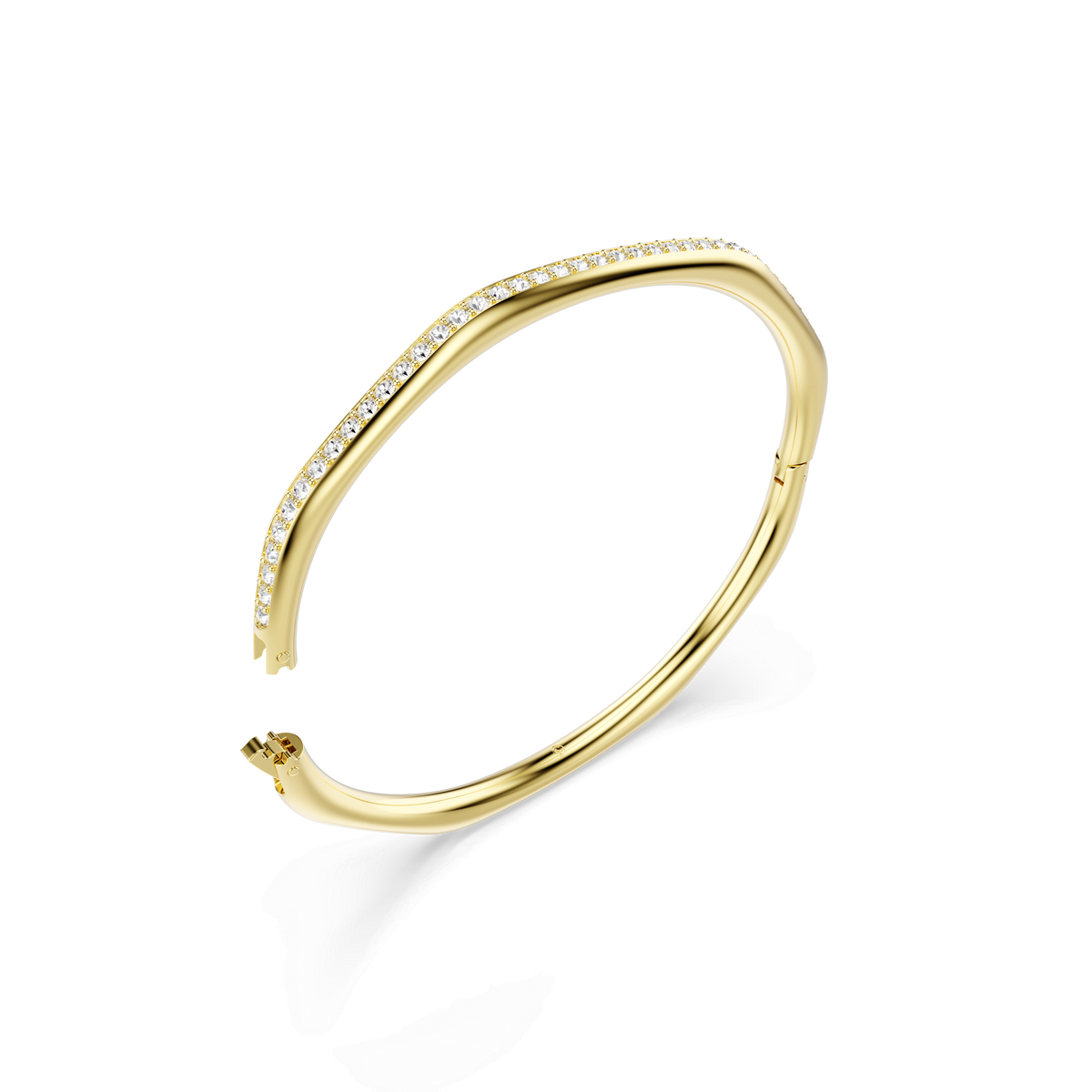 The Swarovski Dextera bangle, finished in 18K gold, features an octagon-shaped, curved, and asymmetrical design with round-cut white crystals set along the top edge, elegantly displayed on a white background.