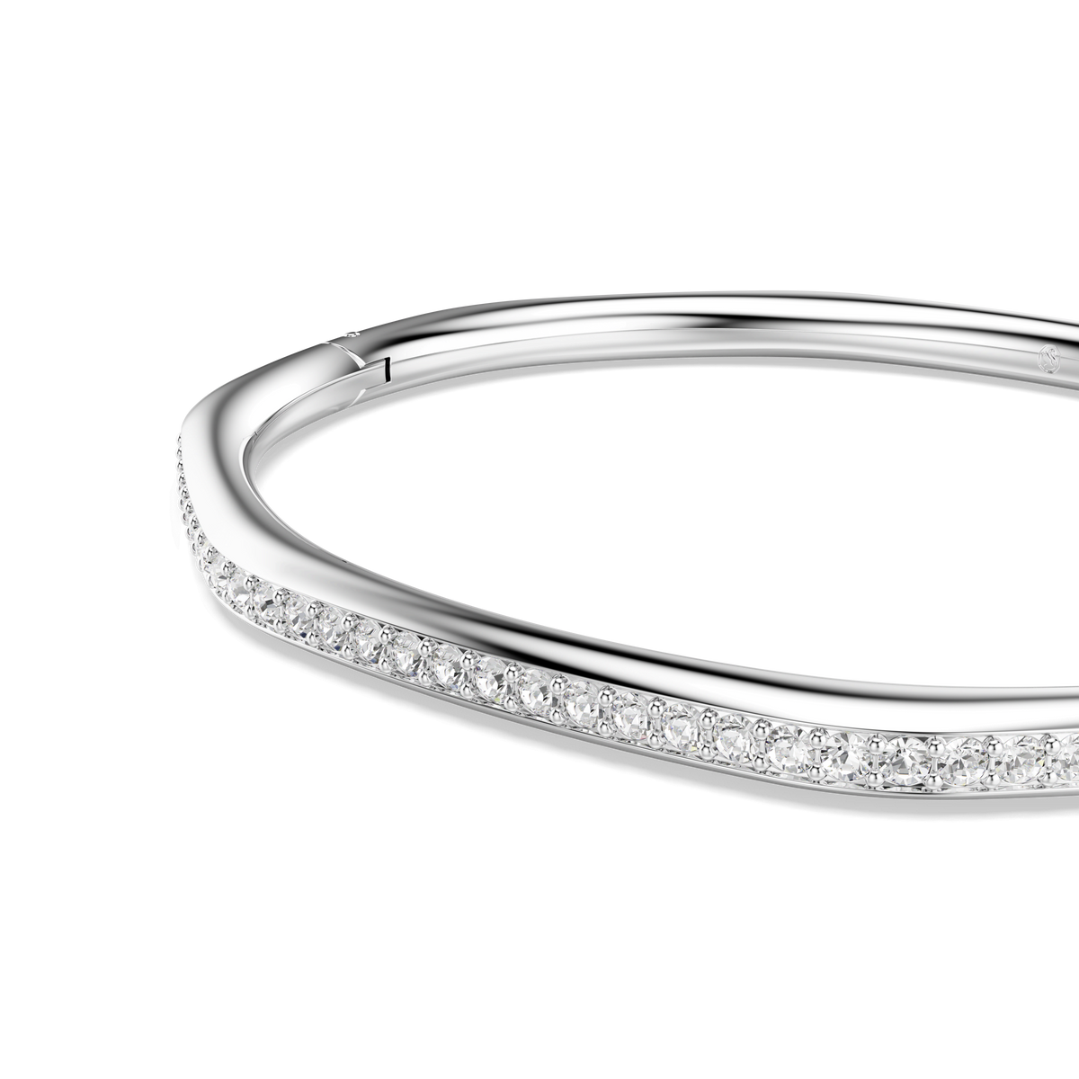 A close-up of the Swarovski Dextera bangle, featuring an elegant rhodium plated octagon shape with round cut white crystals along its outer edge, set against a plain white background.