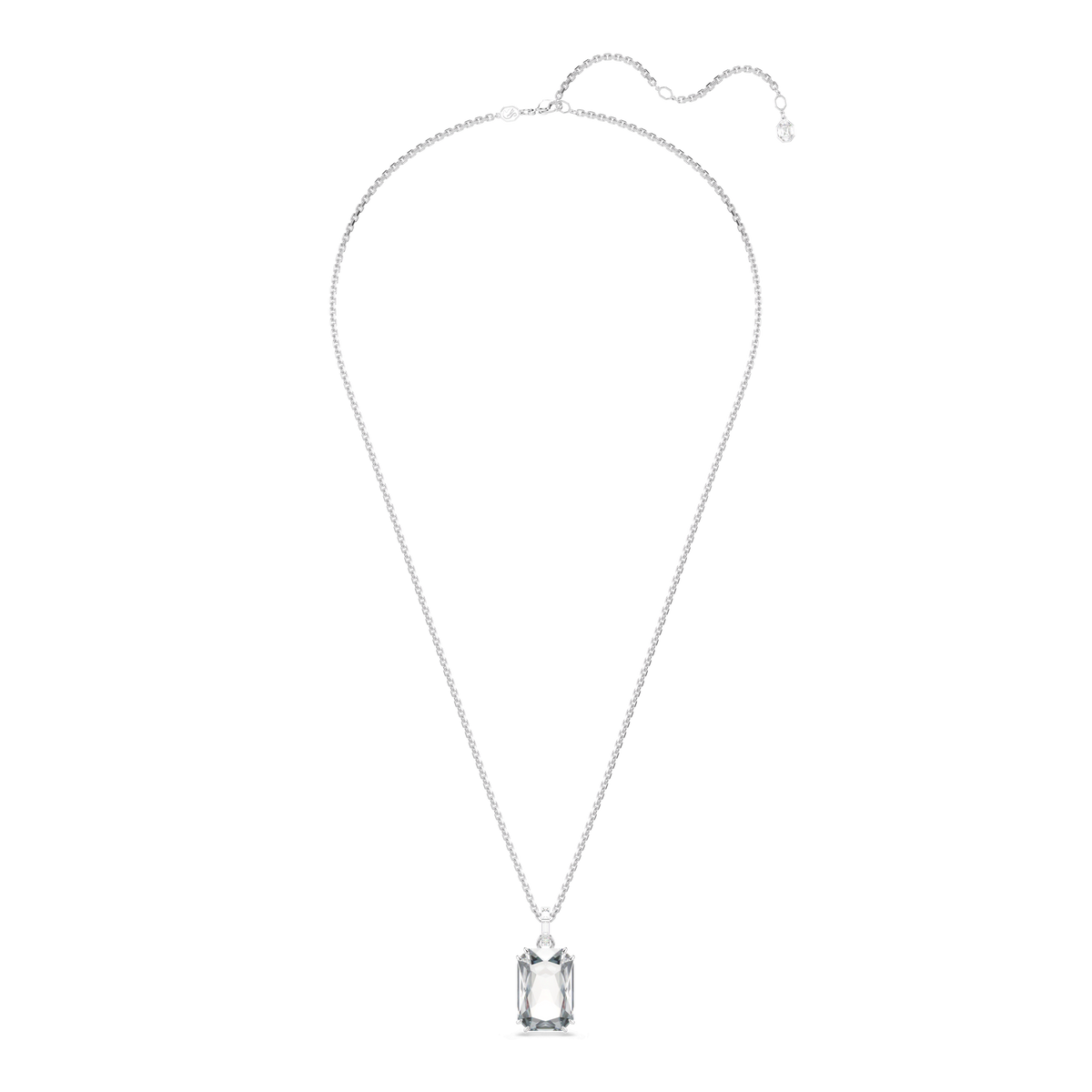 This elegant Swarovski Millenia pendant necklace showcases a large, octagon cut clear crystal at its center, suspended from a fine rhodium plated chain with an adjustable clasp.
