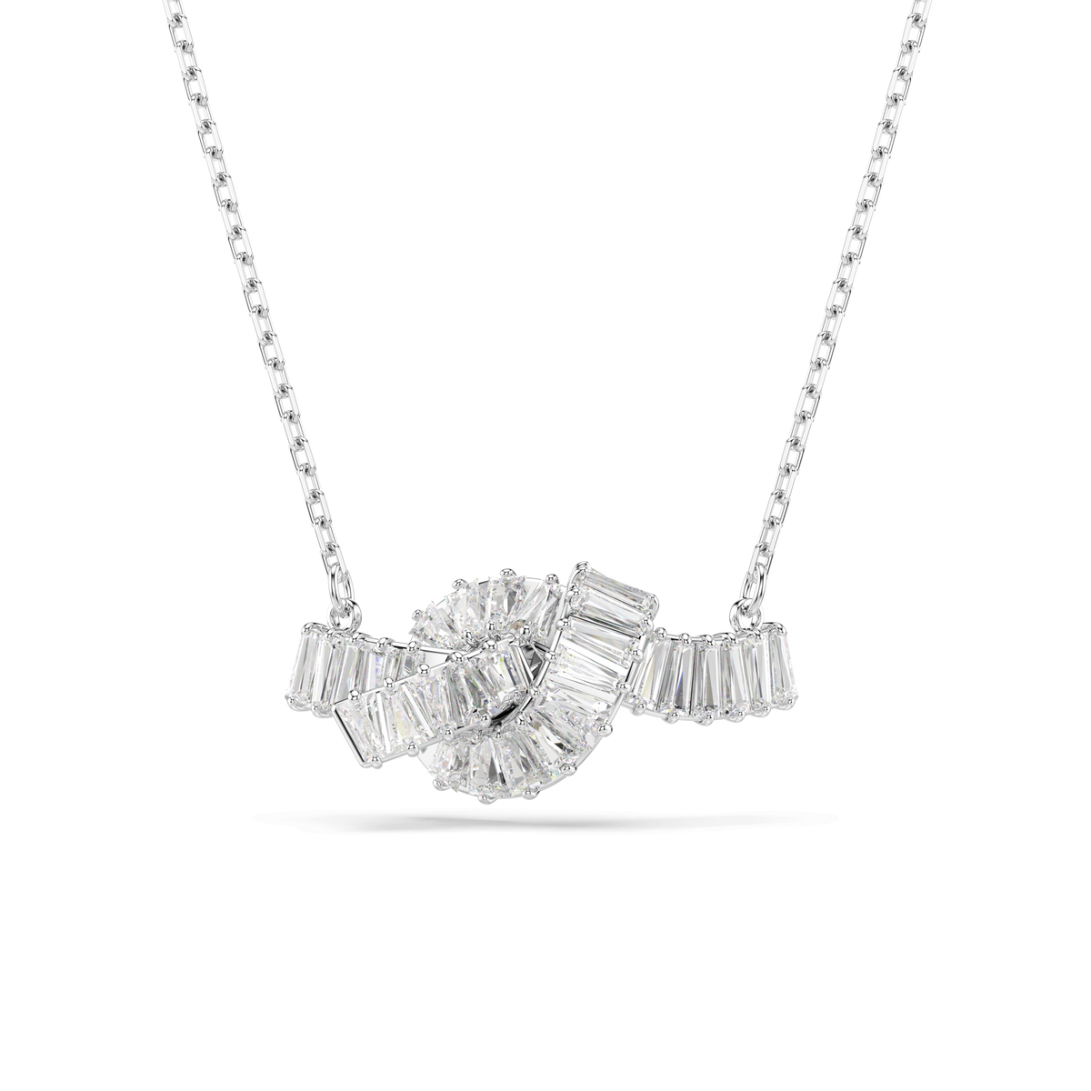A Swarovski Matrix pendant in a knot design, featuring multiple baguette-cut white stones and finished with a beautiful rhodium plating, is displayed on a white background.