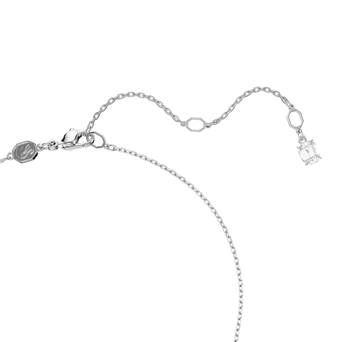 A refined rhodium-plated necklace by Swarovski, featuring the Matrix pendant in a dazzling white baguette cut with an elegant knot detail and a secure lobster clasp, displayed against a plain white background.