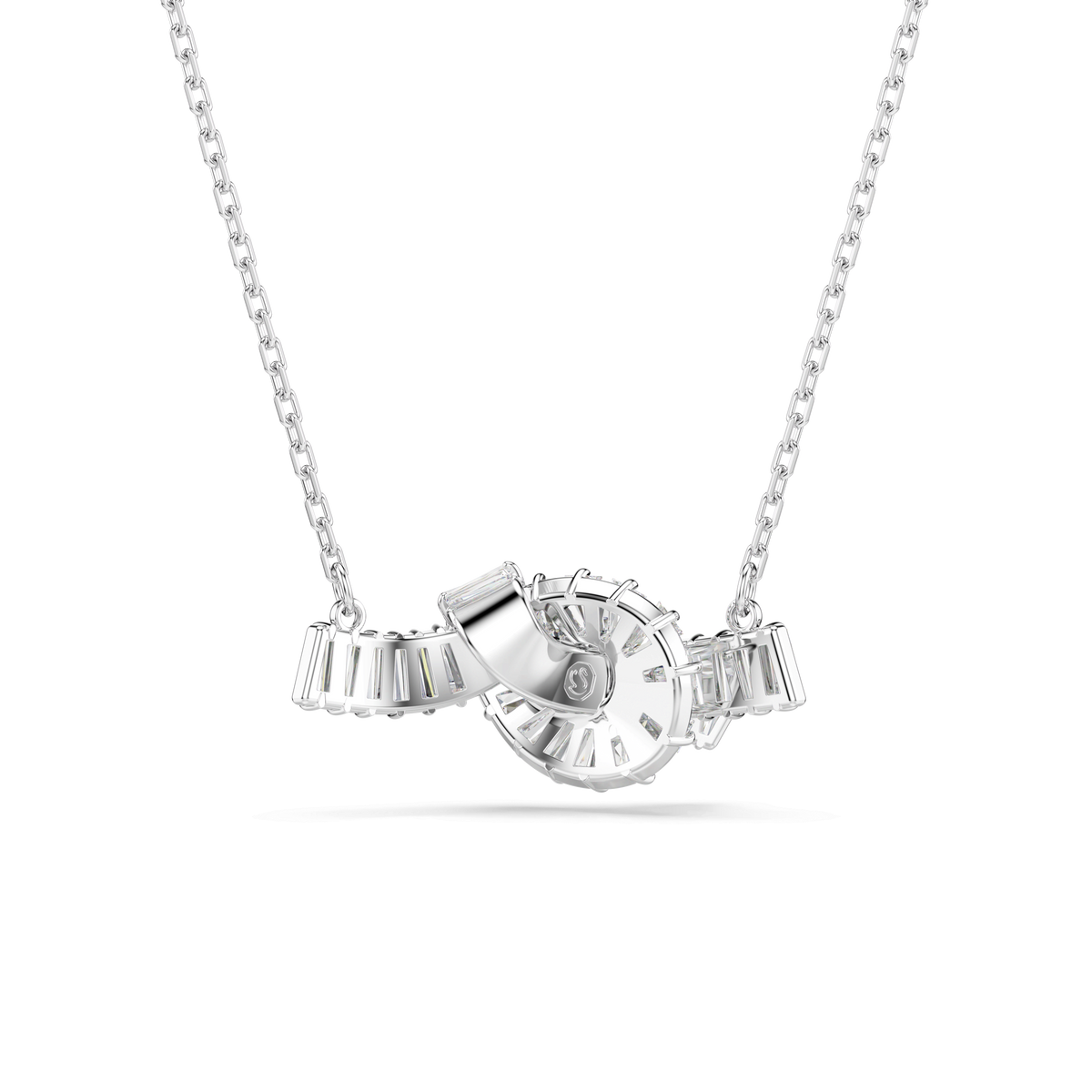 A Swarovski Matrix pendant featuring interlocking knot designs with baguette-cut clear gemstones, crafted in rhodium plating, is displayed on a plain white background.