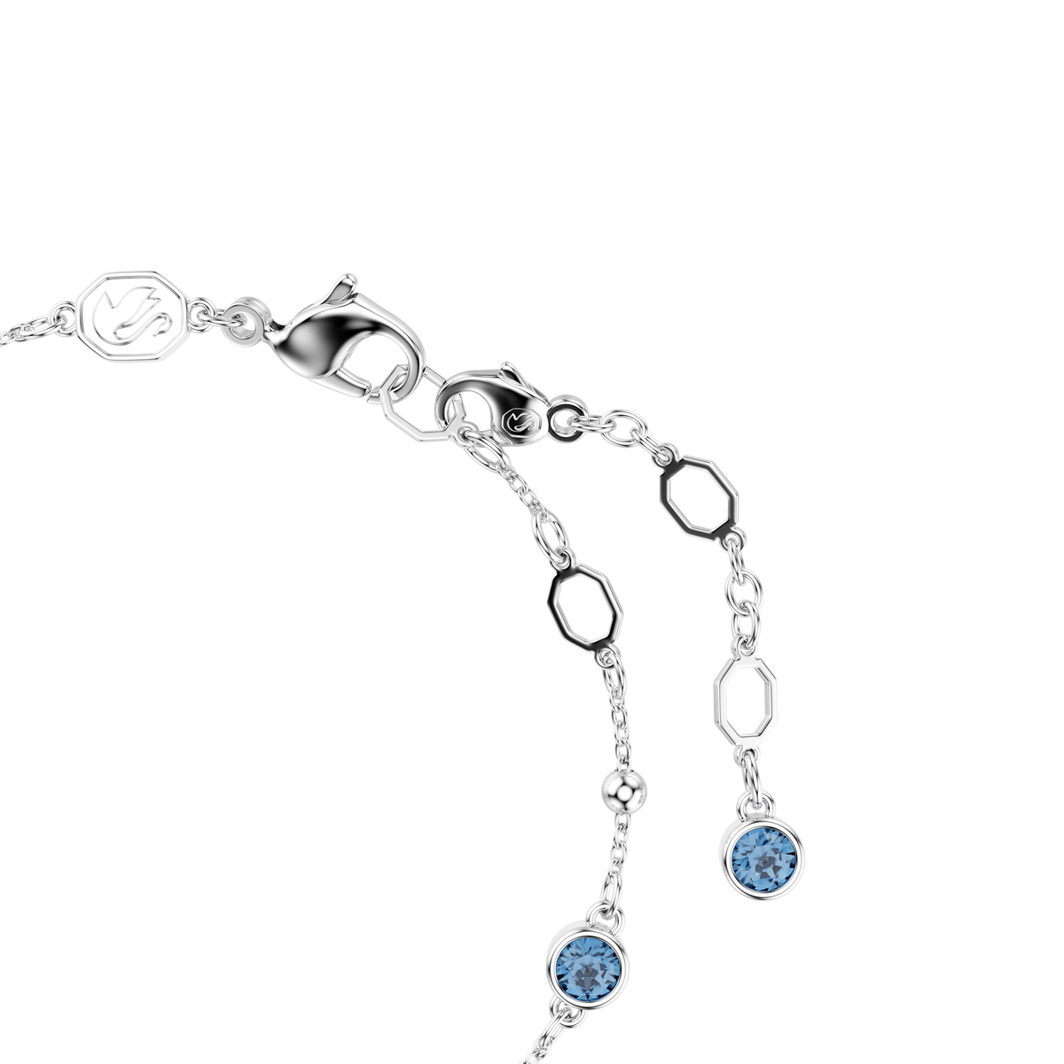 Swarovski Imber bracelet—featuring round-cut blue stones and hexagonal rhodium-plated links with a lobster clasp closure—photographed on a white background, exclusively available at Raffi Jewellers.