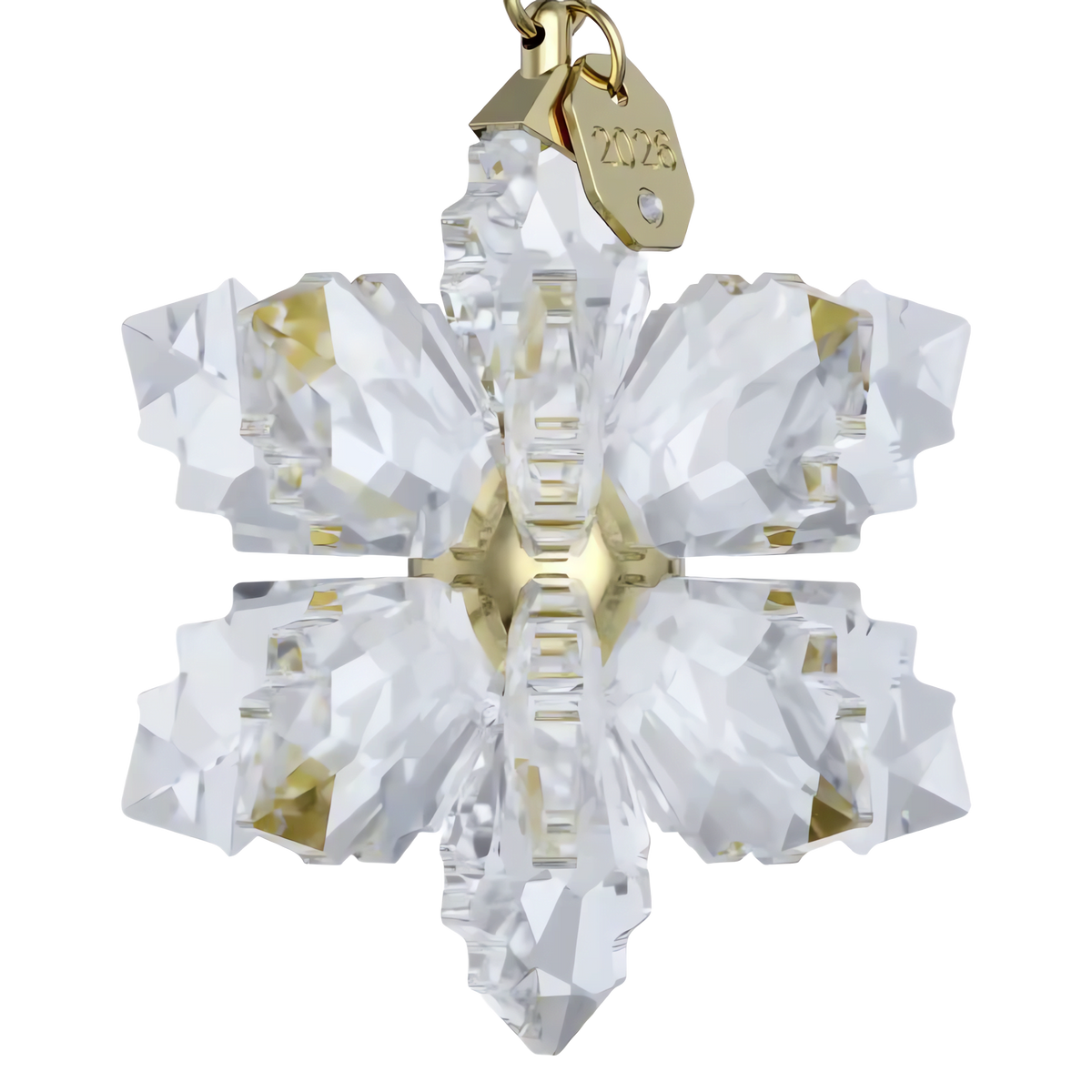 A Swarovski Annual Edition 3D Ornament 2026, this crystal snowflake ornament from Swarovski features gold accents and a gold tag engraved with “2026,” hanging elegantly against a white background.
