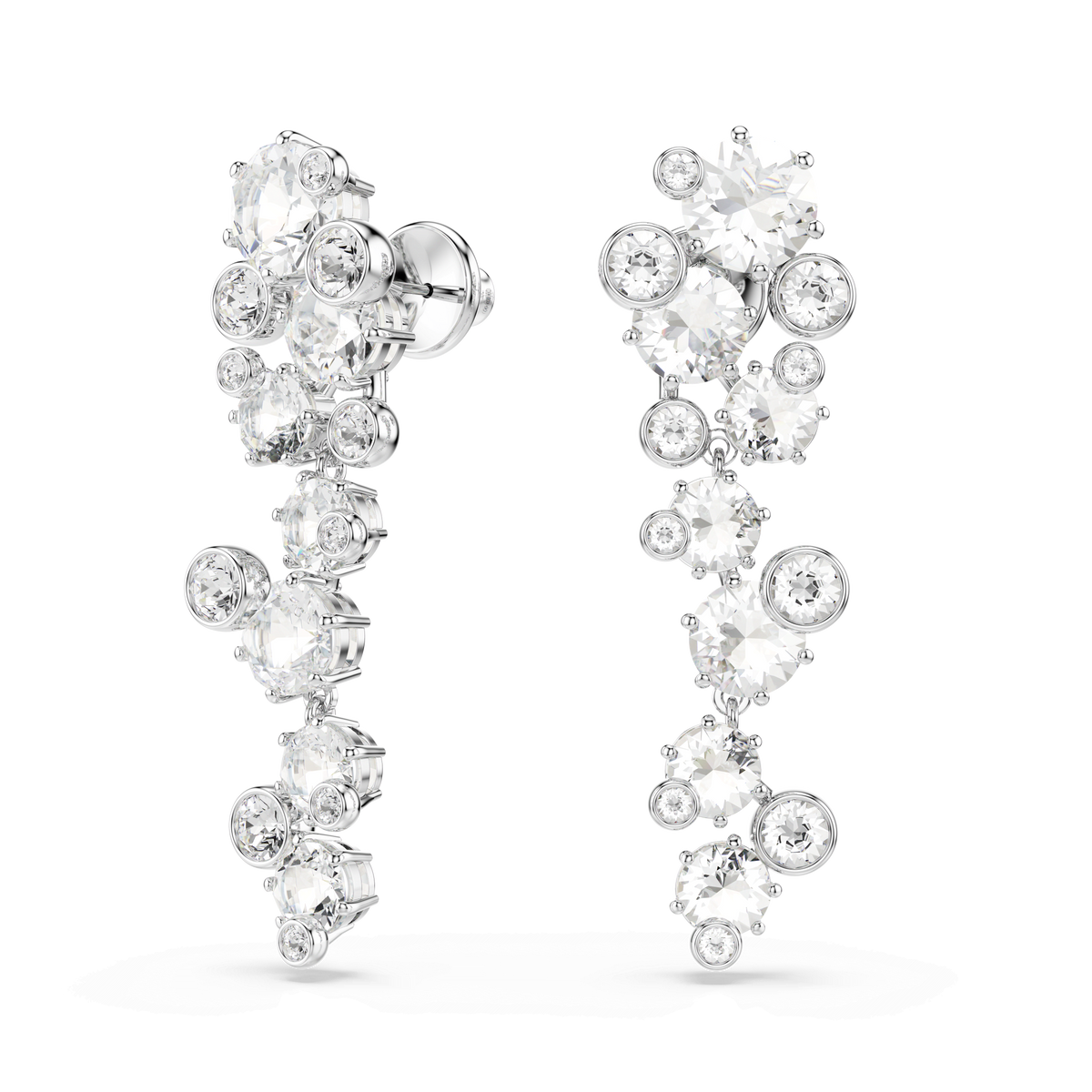A pair of Swarovski Constella drop earrings, featuring mixed-cut white crystals set in rhodium plating and arranged in a cascading design inspired by the iconic collection.
