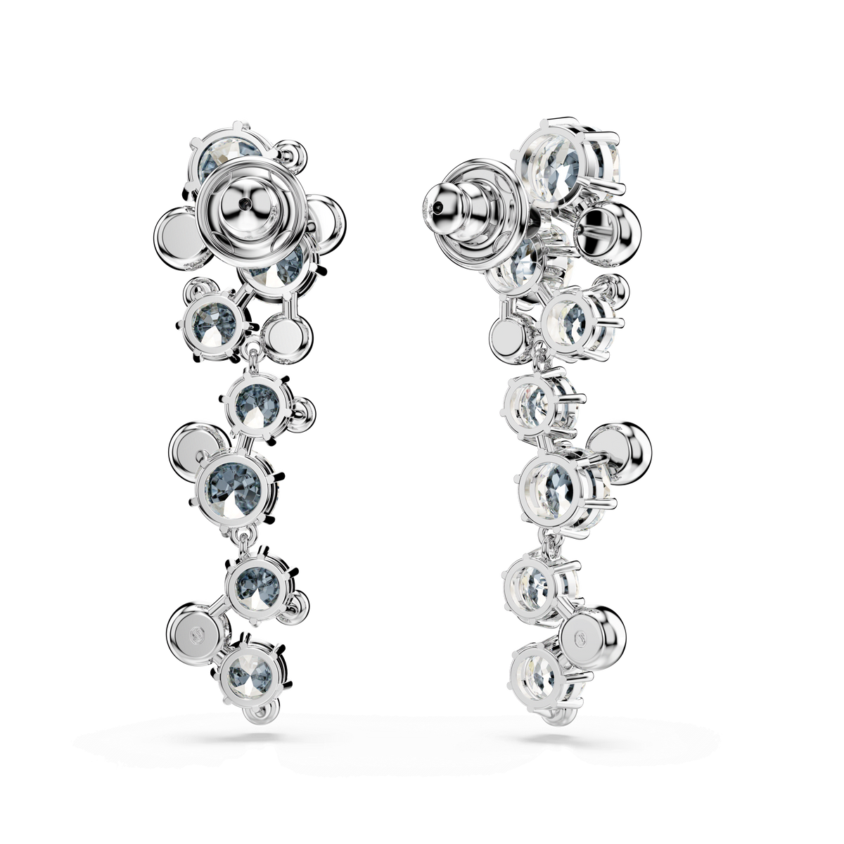 Two Swarovski Constella drop earrings, featuring mixed cuts of sparkling white crystals and finished with a radiant rhodium-plated shine, are displayed against a plain white background.