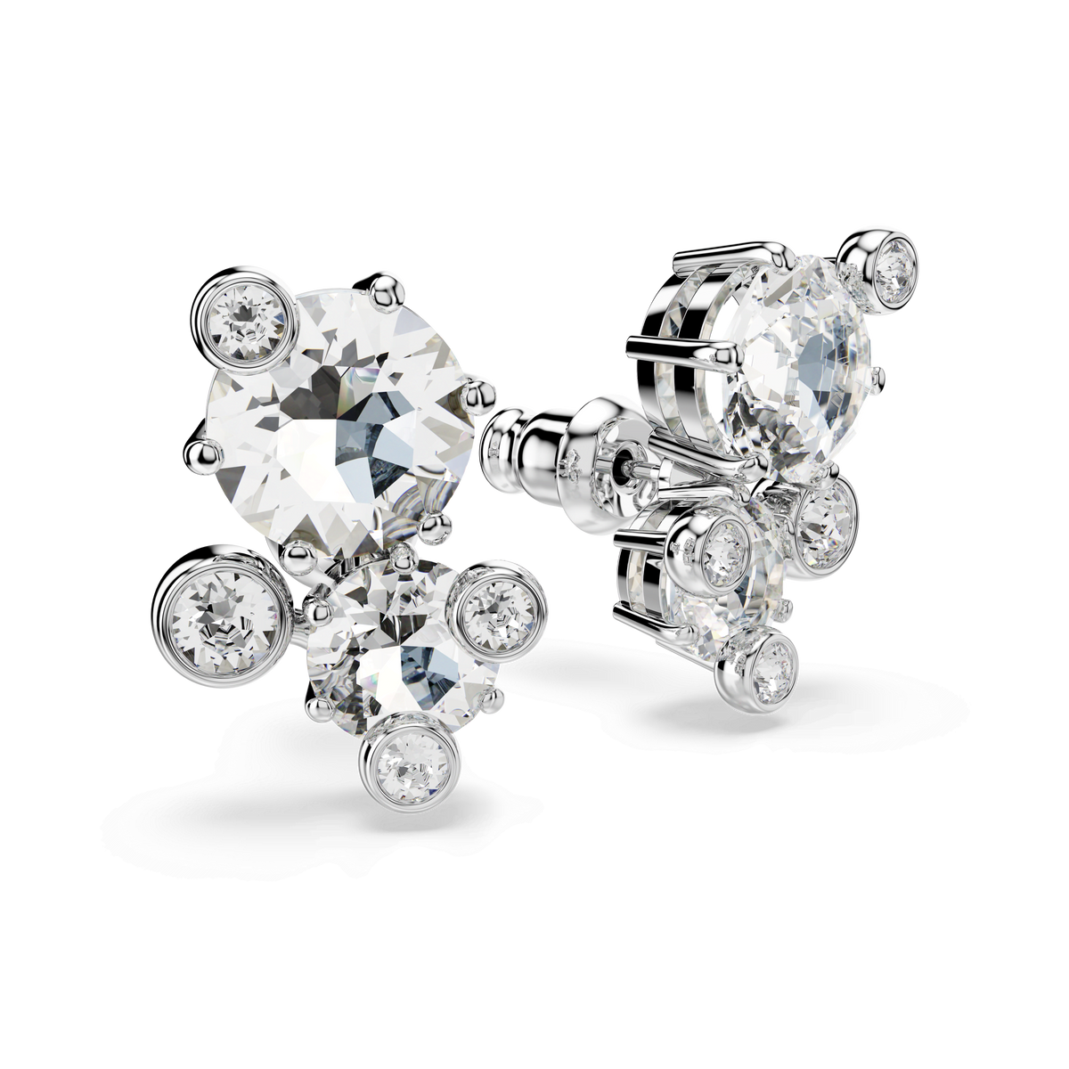 The Swarovski Constella stud earrings by Swarovski feature a round cut design with large white Swarovski Zirconia gemstones surrounded by smaller stones, all set in rhodium plated silver and displayed against a plain white background.