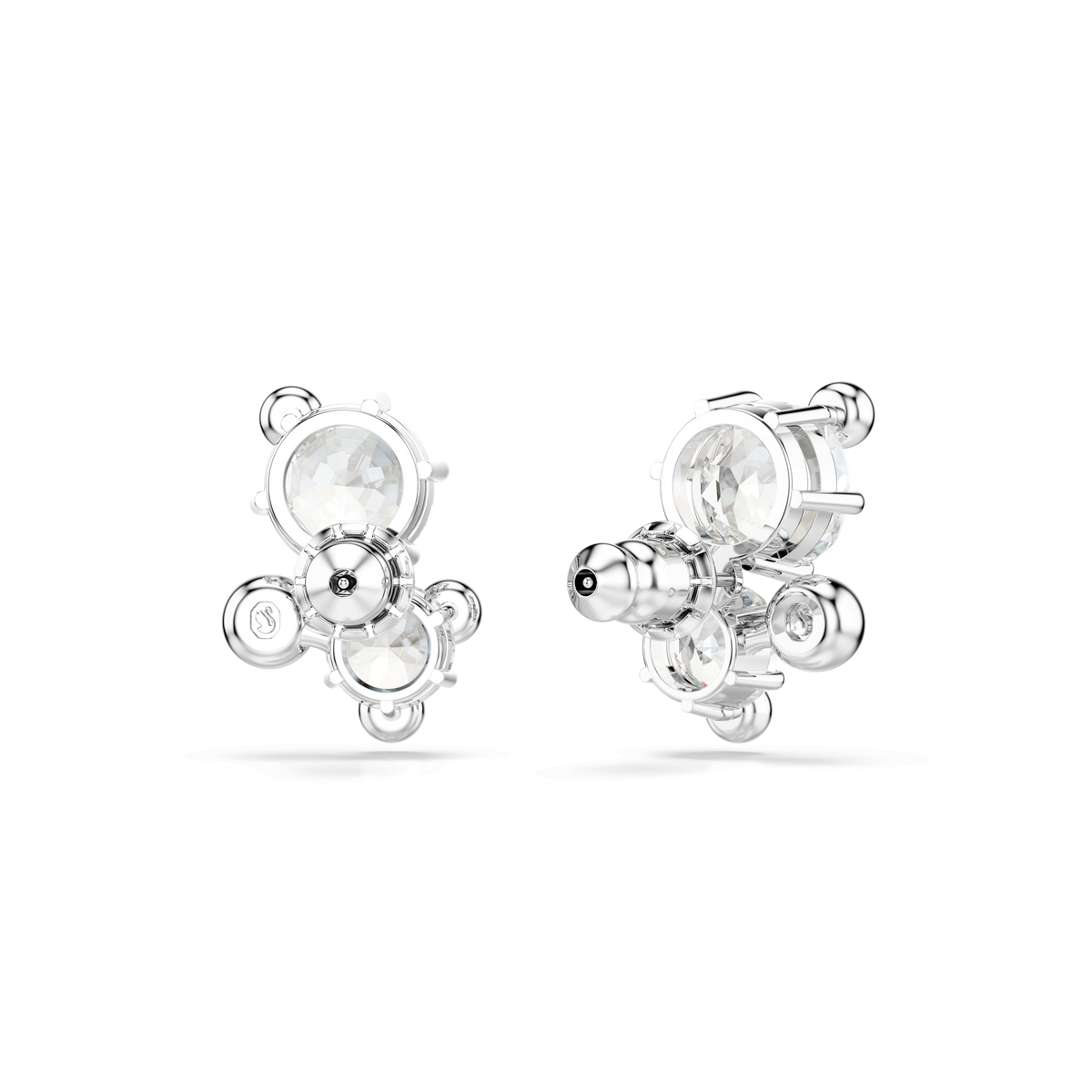 Swarovski Constella stud earrings by Swarovski feature a modern, abstract design with multiple round-cut white Swarovski Zirconia gemstones and sleek metallic accents, all beautifully rhodium plated and showcased against a plain white background.