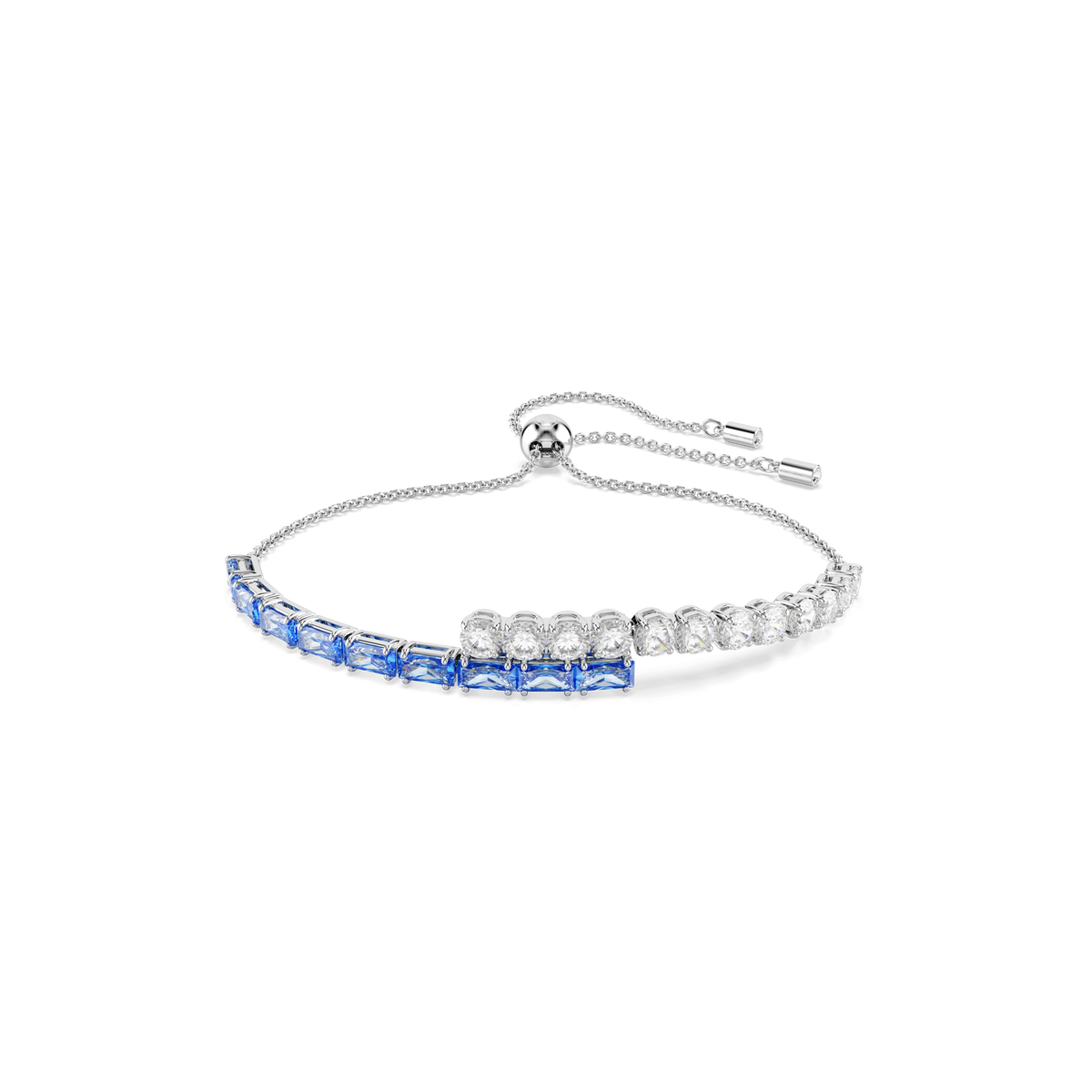 The Swarovski Matrix bracelet features mixed-cut blue stones on a rhodium-plated chain, accented with Swarovski’s signature modern elegance and finished with an adjustable sliding clasp.