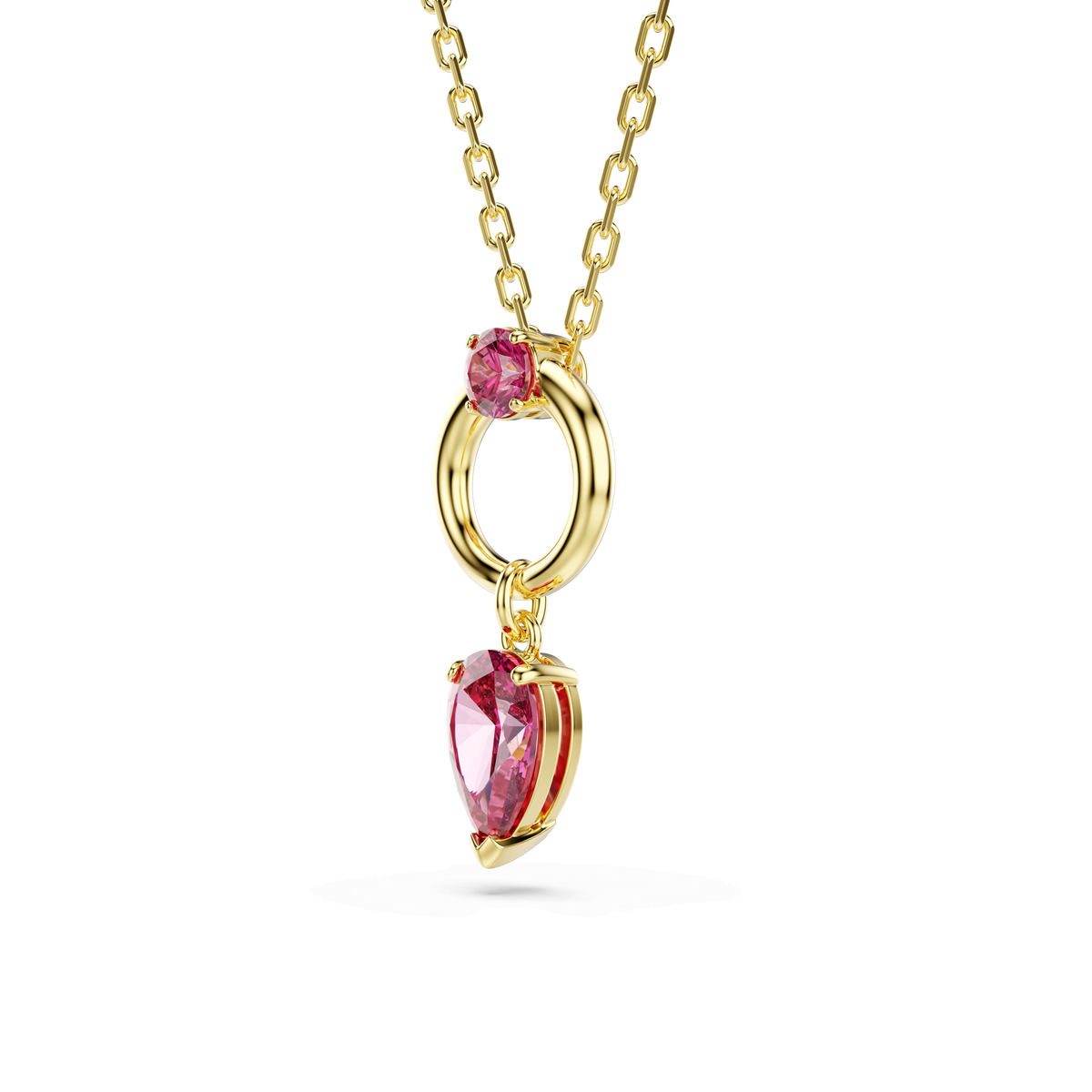 Experience the elegance of the Swarovski Mesmera Pendant RED/GOS, offered by Raffi Jewellers. This remarkable gold-toned necklace from Swarovski features a circular link highlighted by two sparkling pink stones—a round gemstone above and a gracefully suspended pear-shaped gem below—each set in brilliant gold. The sophisticated oval link chain completes this refined accessory. Discover the beauty of this Swarovski Canada masterpiece today.
