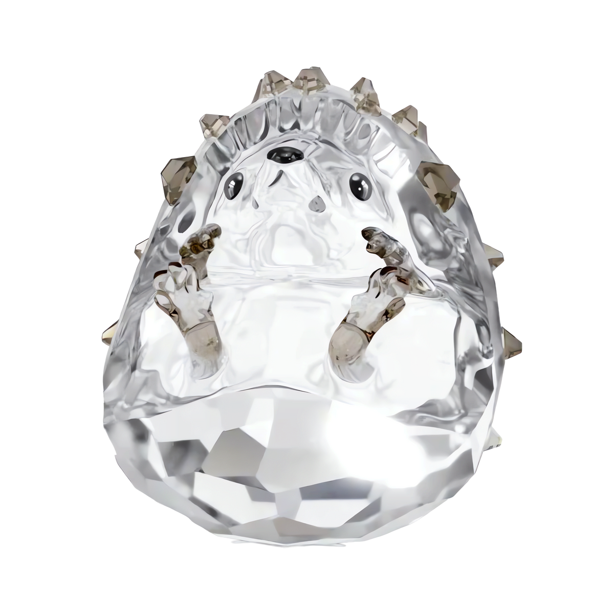 The Swarovski Idyllia Hedgehog by Swarovski features a rounded, faceted body with clear and smoky glass spikes and black eyes, making it a perfect crystal figurine to add a charming touch of autumn forest style to your décor.
