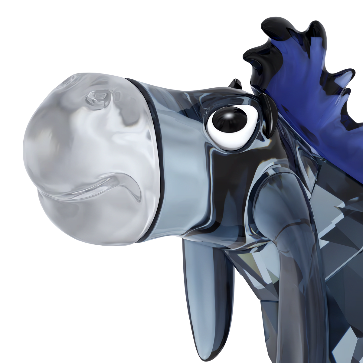 A close-up of a Swarovski Winnie The Pooh Eeyore glass figurine shaped like a donkey with a sad expression, featuring blue and clear reflective surfaces.